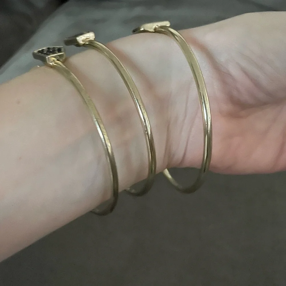Set of 3 gold and black bangle bracelets